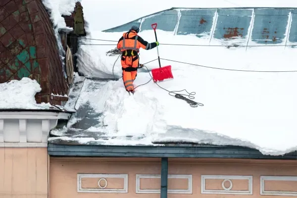 Winter property maintenance services providing snow and ice control to keep surfaces safe and accessible