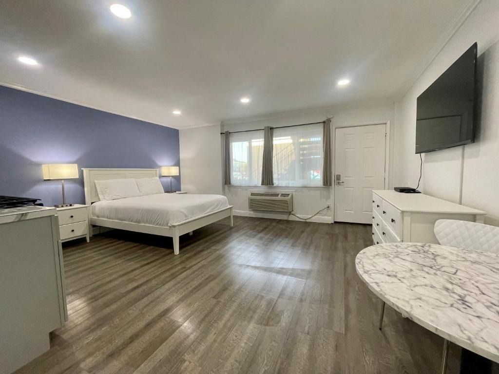 There is a large bed in the middle of the room.