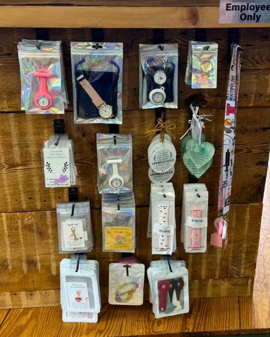 Gifts and personal items including watches, bag bling, and pens.