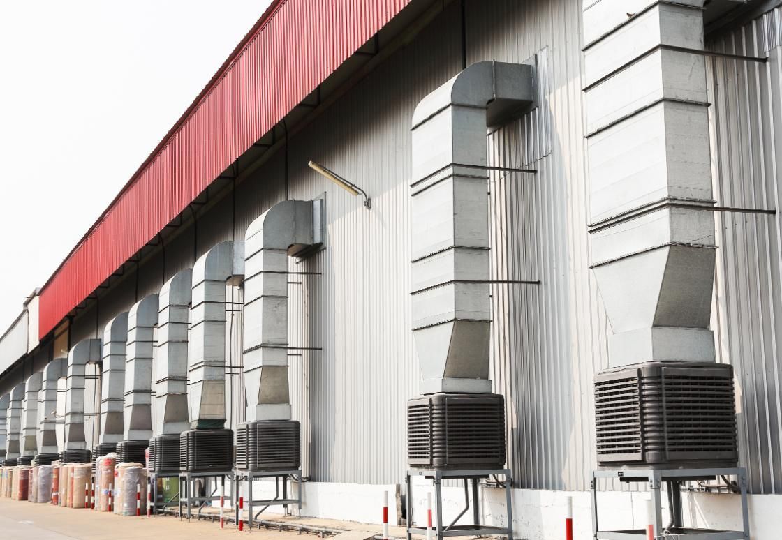 A Large Building With a Red Roof — FVS Airconditioning & Electrical Pty Ltd in Karumba, QLD