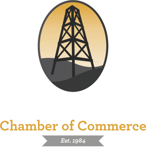 Chamber of Commerce logo with a black oil derrick over a golden oval and “Est. 1984” ribbon