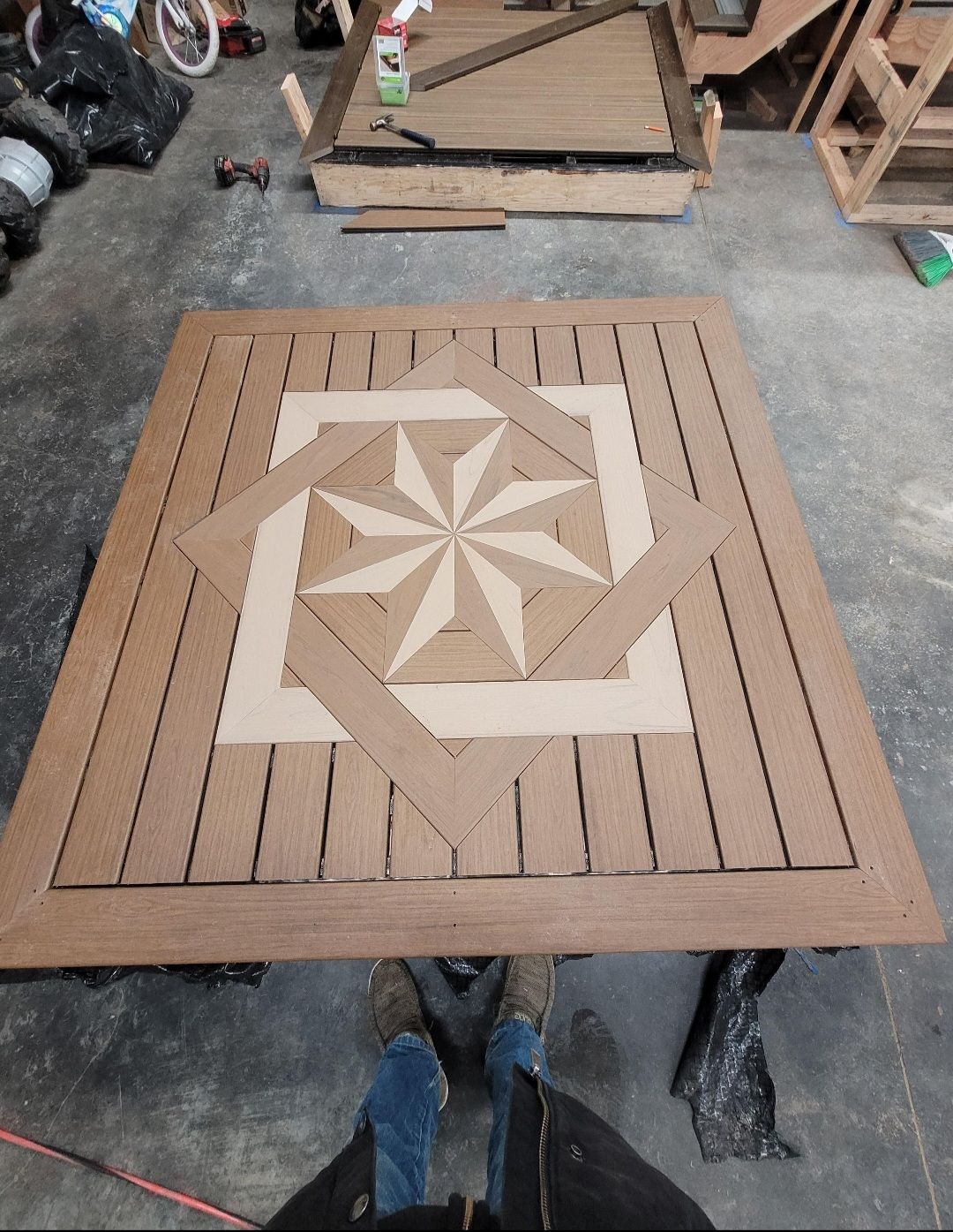 A wooden table with a star design on it