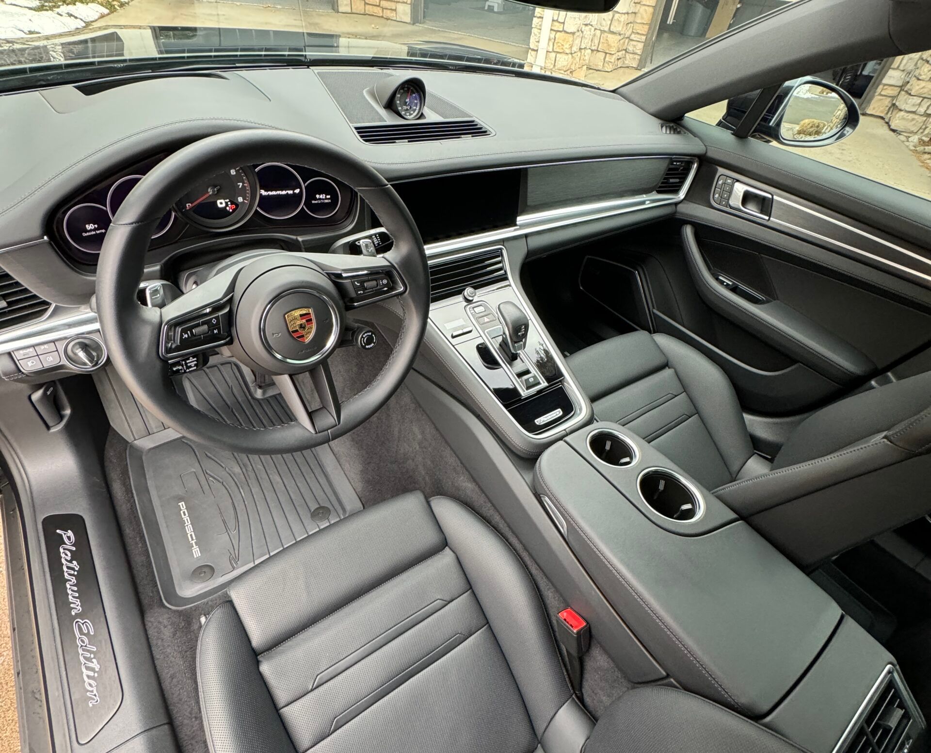 The interior of a porsche panamera turbo s is shown.