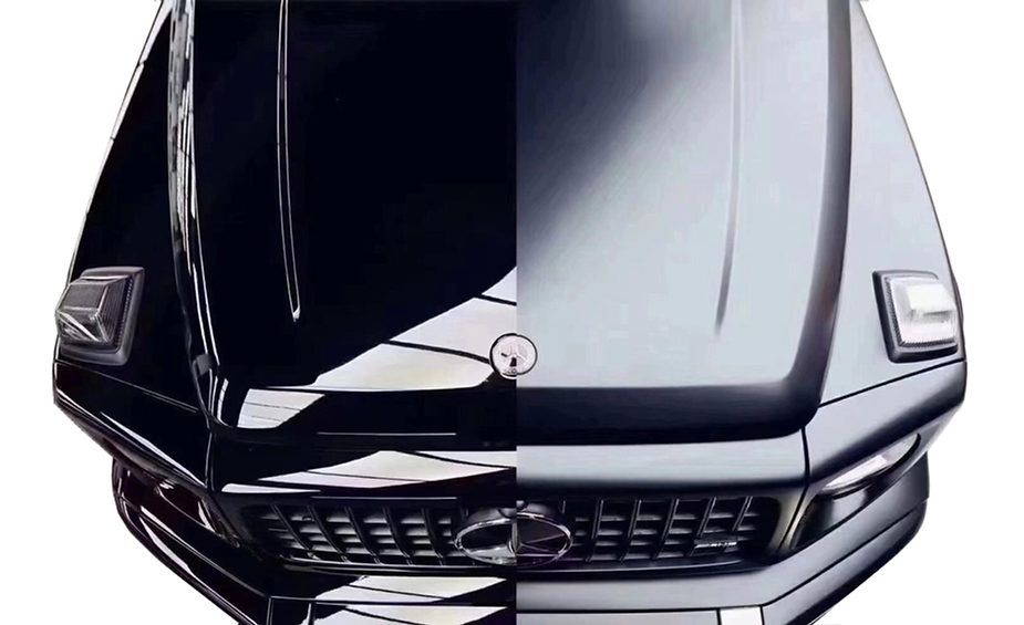 Two pictures of a black car on a white background