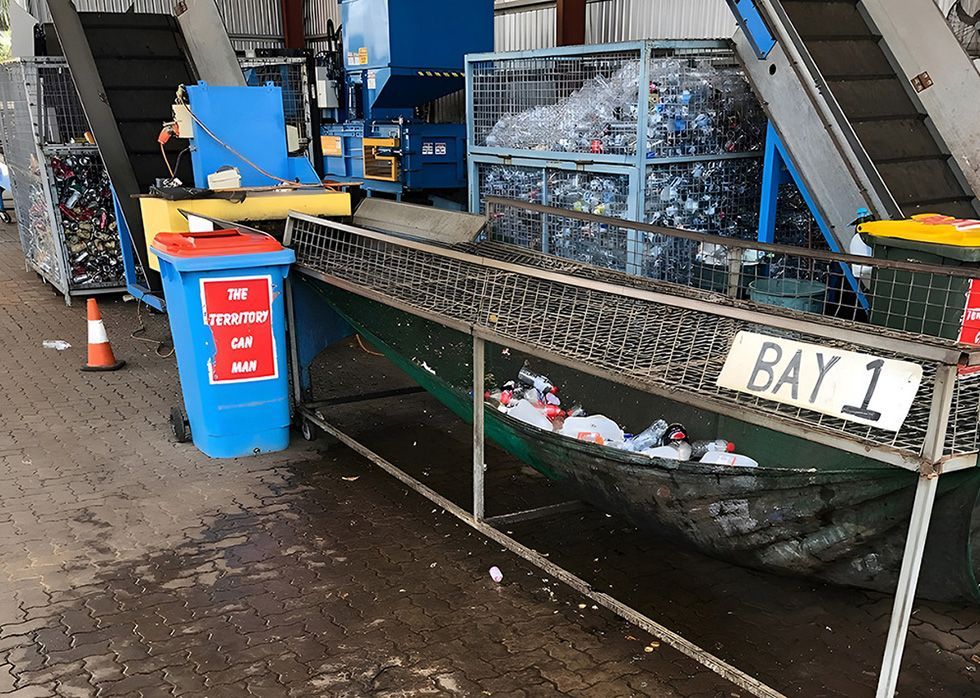 Recycling Facility Sorting Plastic Bottles And Cans