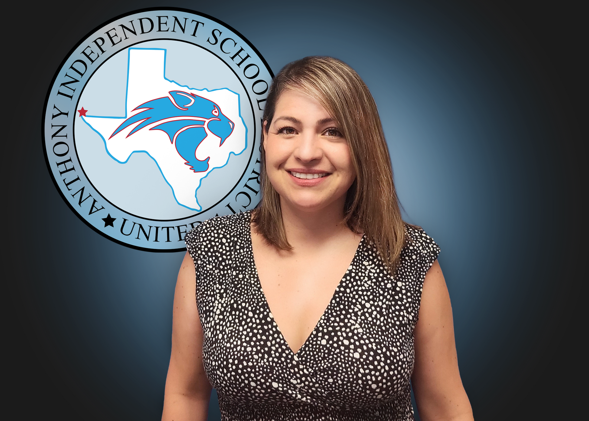 A woman stands in front of a logo for anthony independent school district