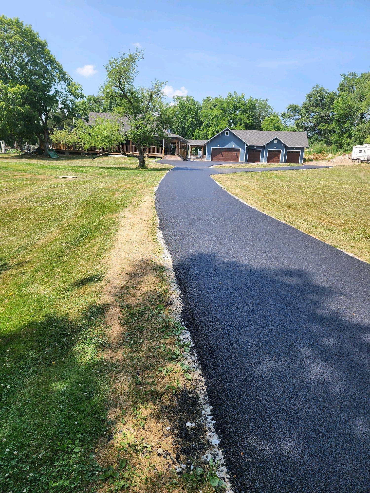 Asphalt Driveway Leading to a House — Plainfield, IL — Pro Blacktop Paving
