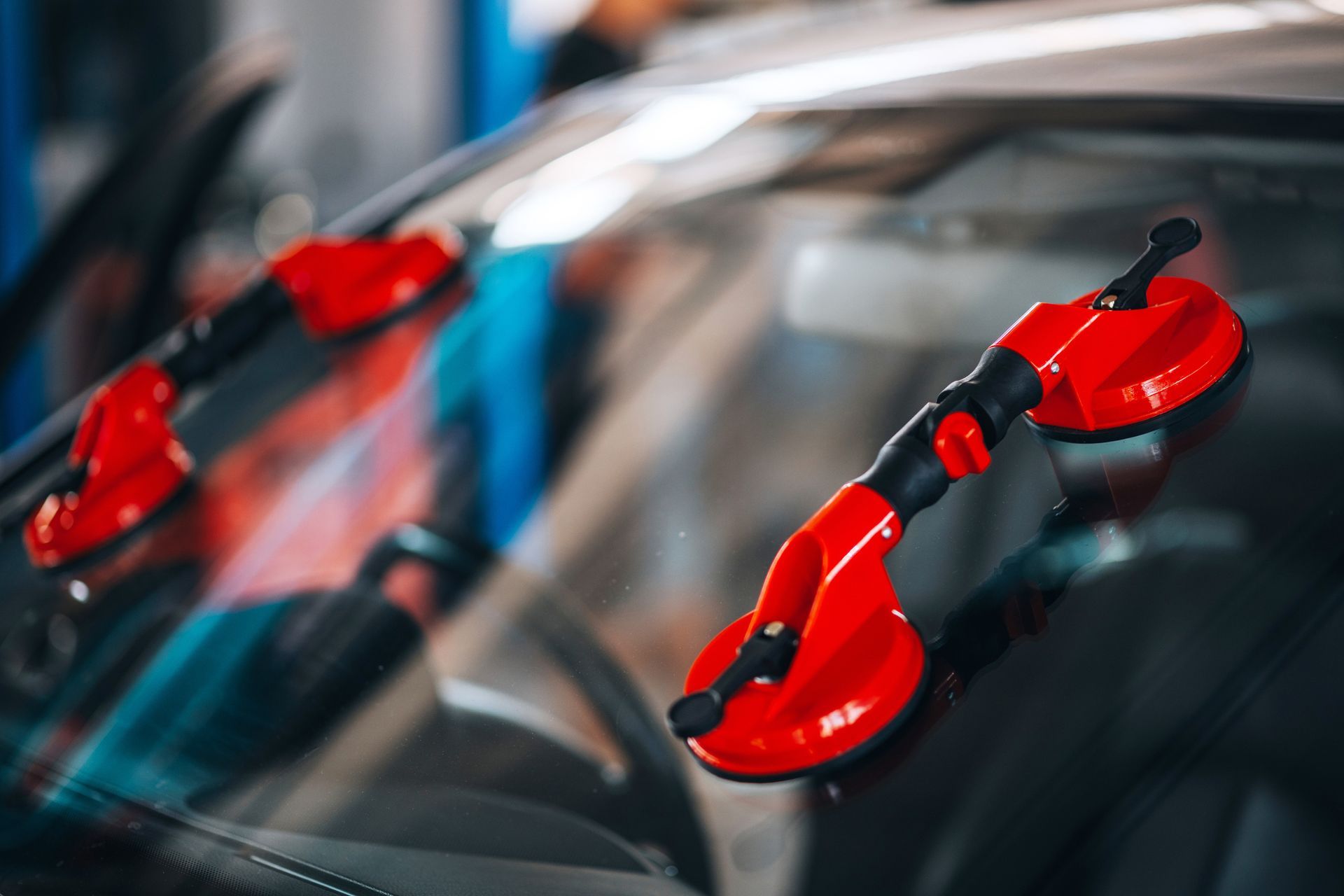 Suction Cup Lifter On Car Windshield — Forbes, NSW — Butlers Windscreens Suction Cup Lifter On Car Windshield — Forbes, NSW — Butlers Windscreens