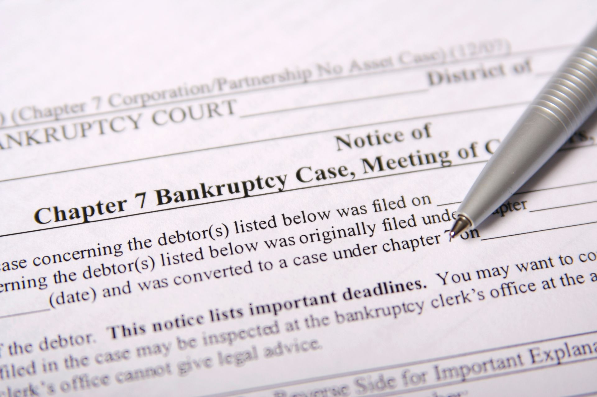 View of Chapter 7 bankruptcy paperwork with McManus and Associates, a Chapter 7 bankruptcy attorney in Indianapolis, IN. View of Chapter 7 bankruptcy paperwork with McManus and Associates, a Chapter 7 bankruptcy attorney in Indianapolis, IN.
