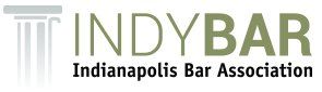 Logo for IndyBar: Indianapolis Bar Association, with a column design and green text.