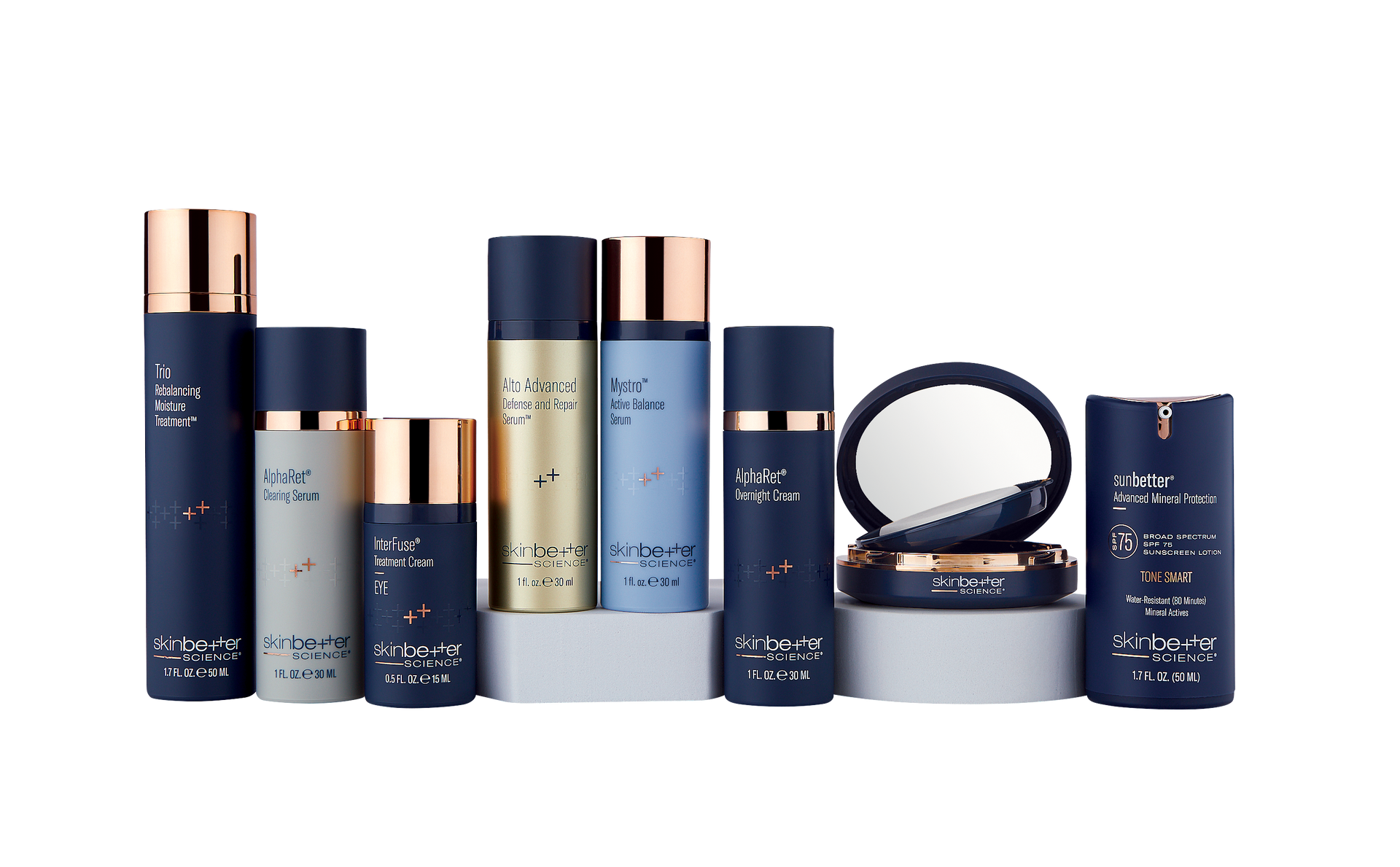 A bunch of bottles of tizo cosmetics are laying on a table.