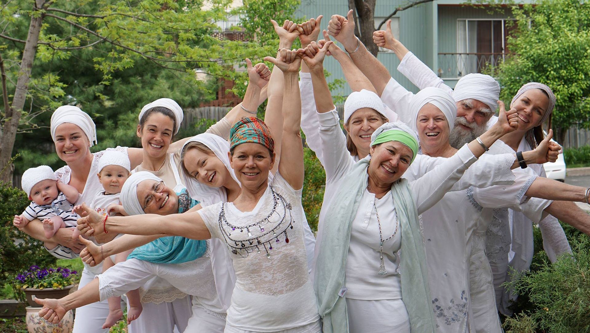 a woman is doing an impressive yoga pose on the ground