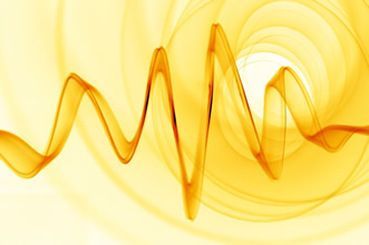 A close up of a yellow wave on a white background.