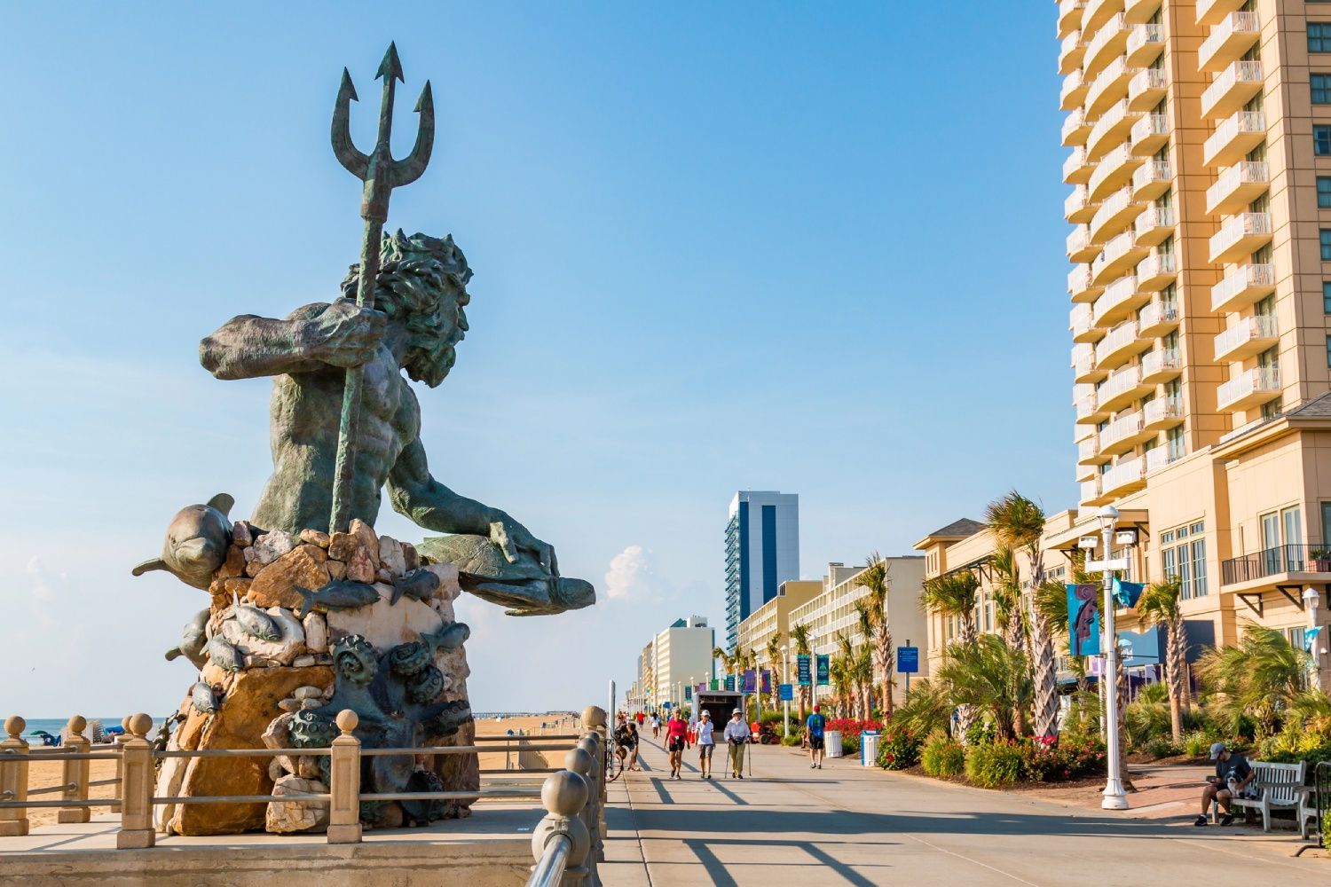 the monumental bronze statue of Neptune overlooking the oceanfront in Virginia Beach, VA