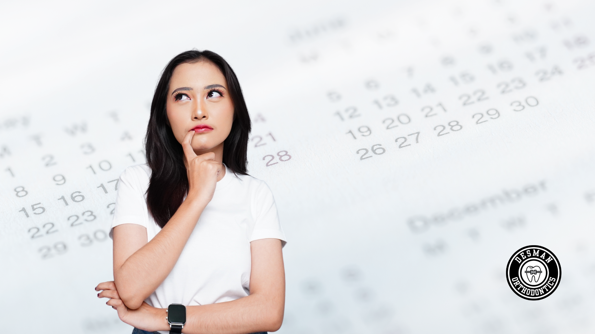 Woman in a white shirt thinking, with a blurred calendar background.