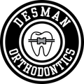 Black-and-white Desman Orthodontics logo with a tooth and braces icon inside a circular emblem