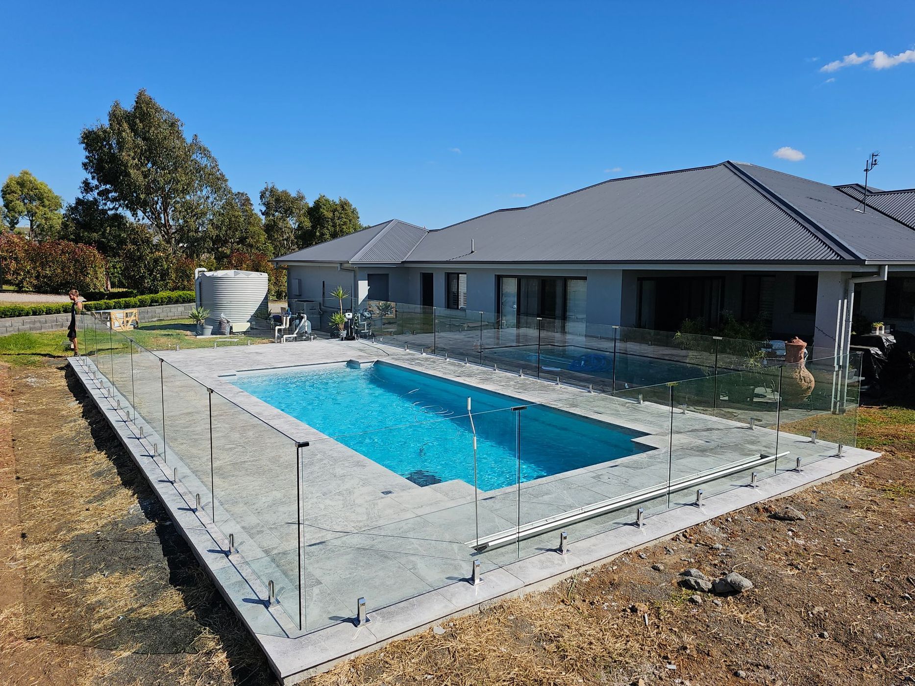 Rectangular Swimming Pool With Clear Glass Fencing — Newcorp Pools In Moore Creek, NSW