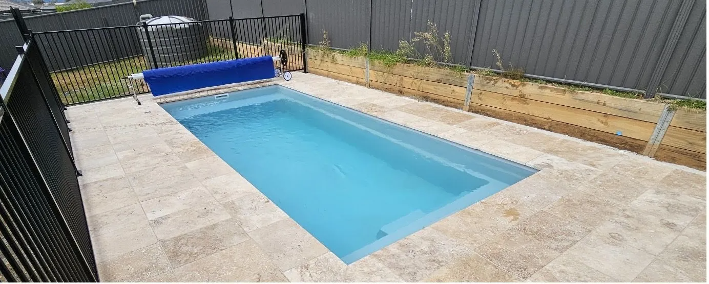 A Rectangular in-ground Swimming Pool With Blue Water — Newcorp Pools In Moore Creek, NSW