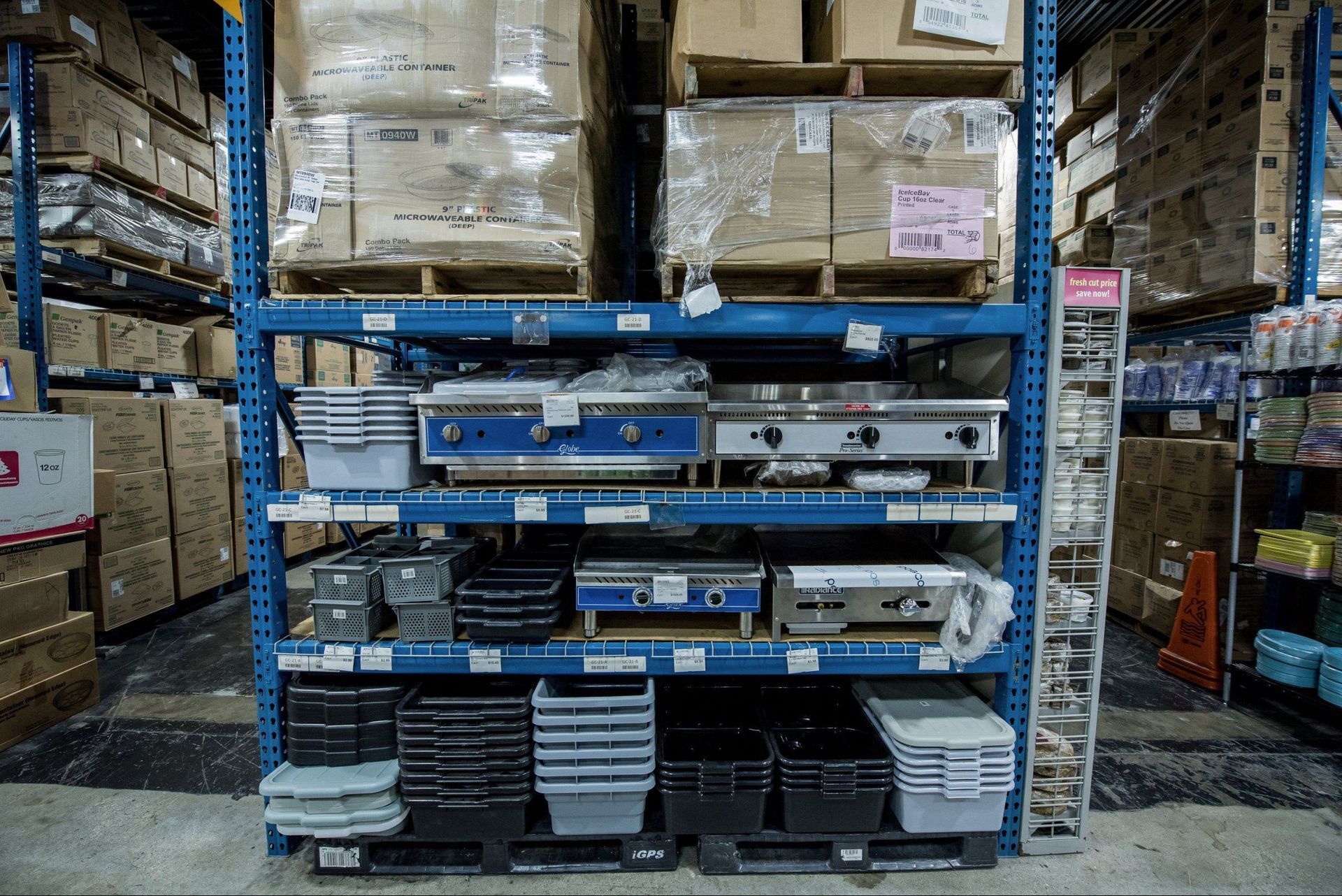 A warehouse filled with lots of shelves and boxes.
