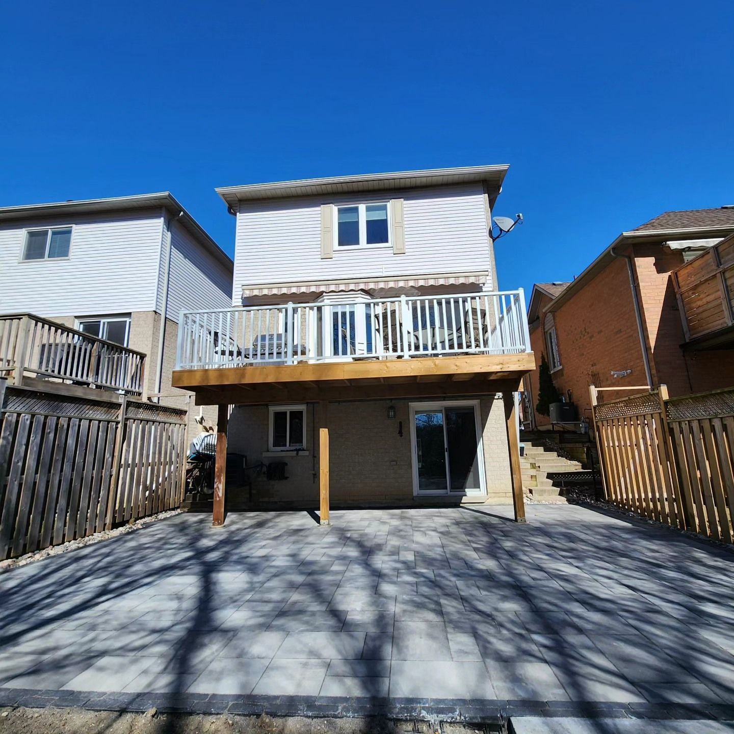 The back of a house with a large deck