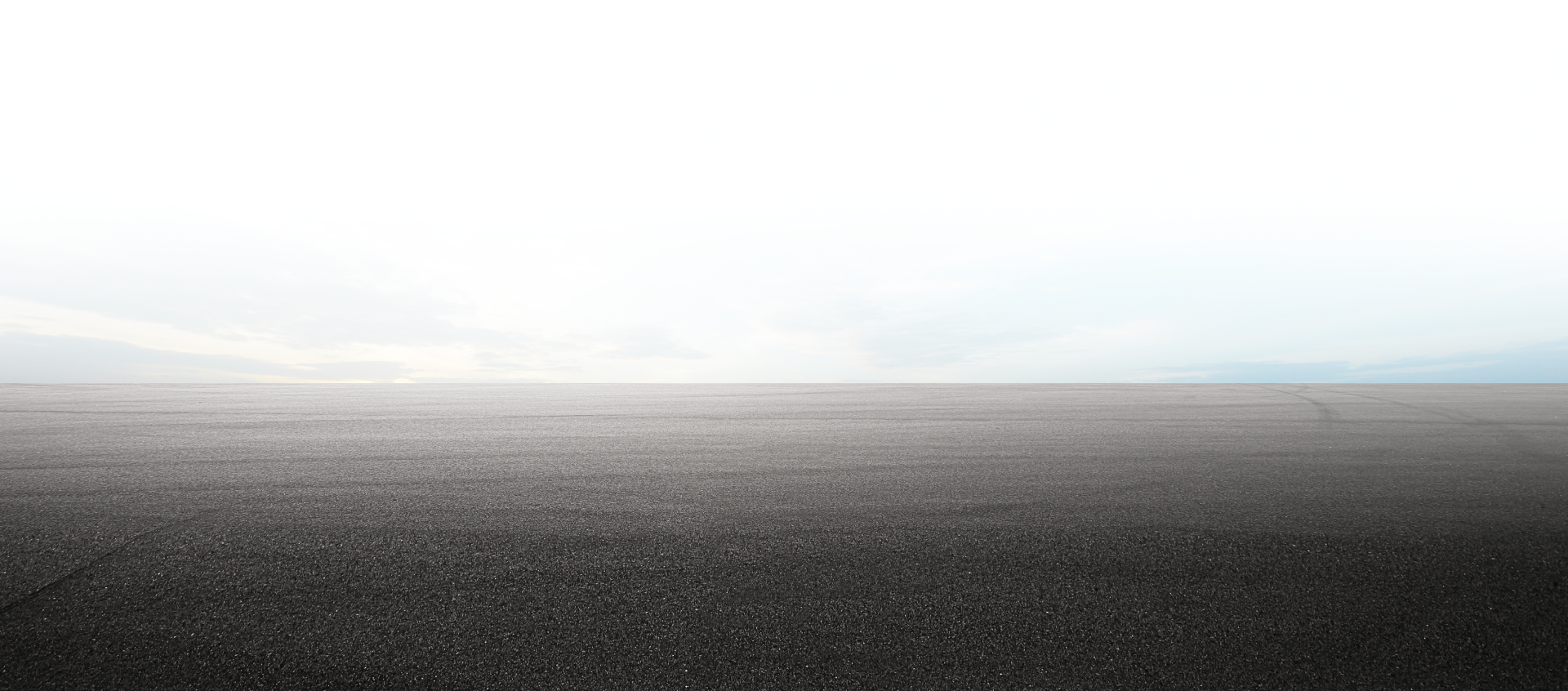 Background with cement and skies | Manny's Auto