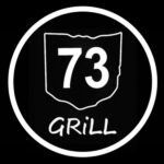Black circular logo with white outlined shield, “73,” and the word “GRILL” underneath
