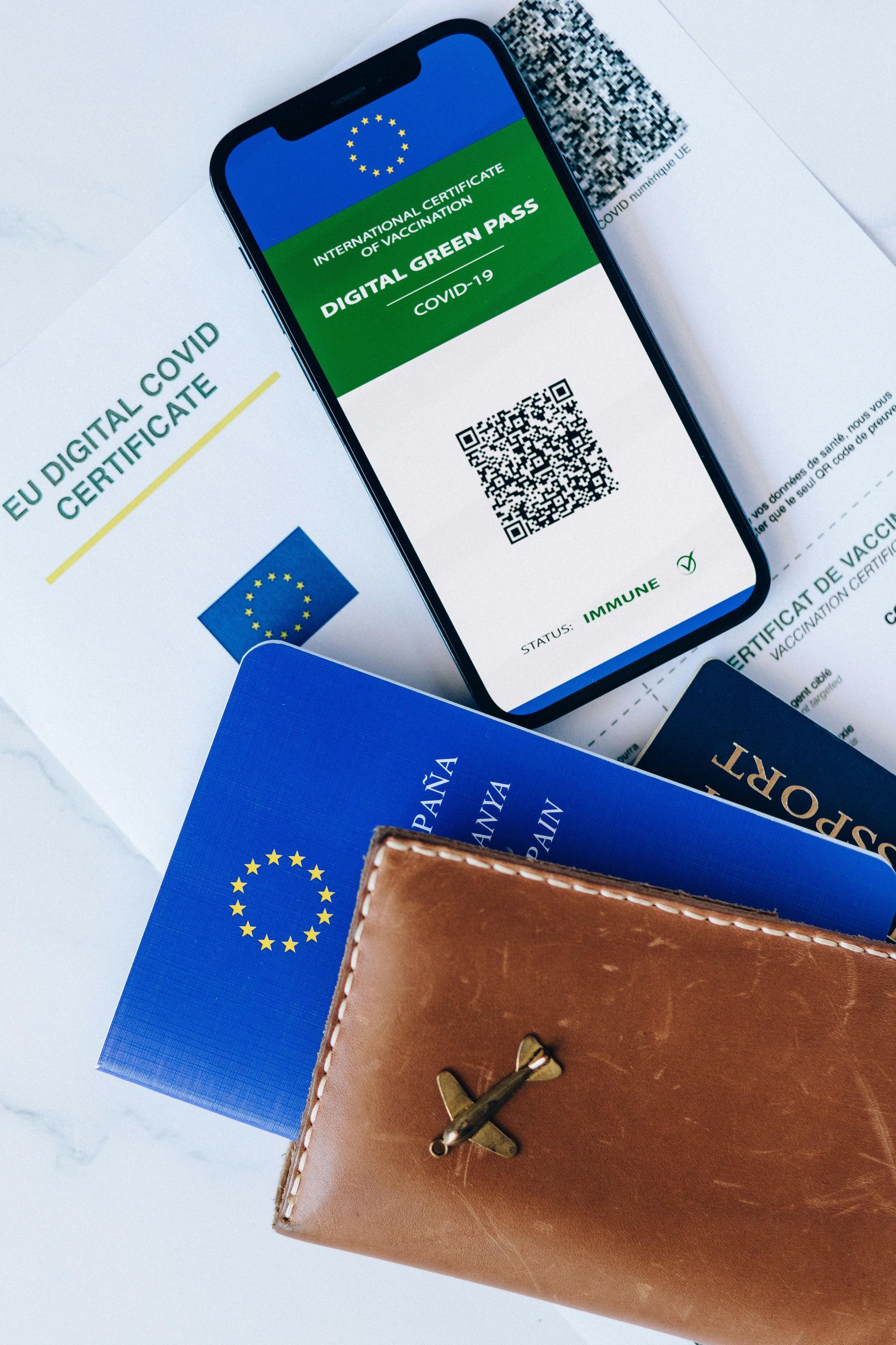 Passports and other official documents in a loose pile.