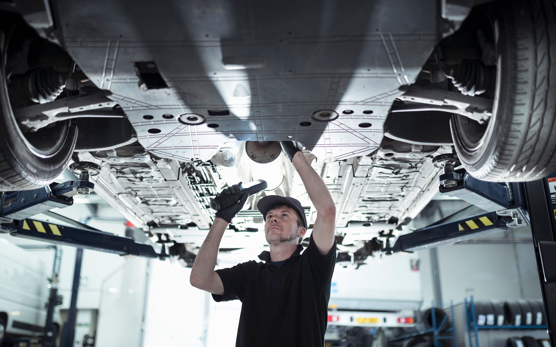 Man Checking The Car — Augusta, GA — Car Plus LLC