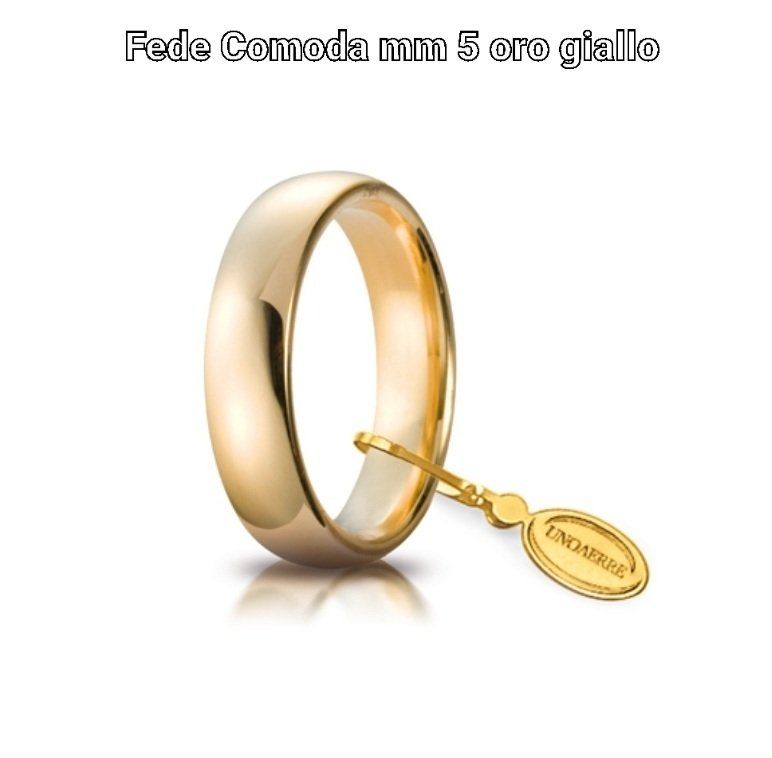 Fede nuziale in oro con targhetta in oro giallo.