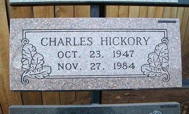 Gravestone plaque reading “CHARLES HICKORY” with dates Oct. 23, 1947 and Nov. 27, 1984.