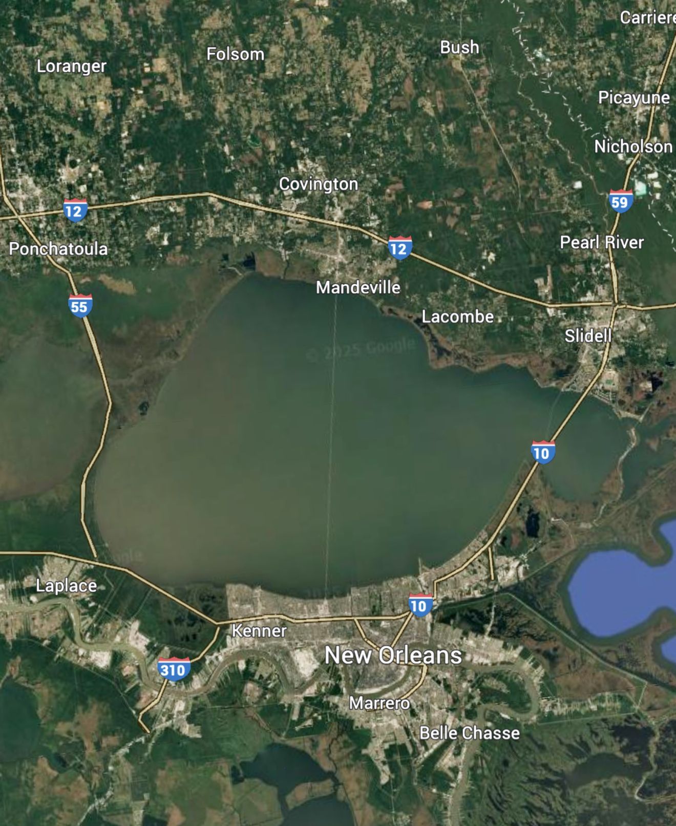 Satellite view of Lake Pontchartrain, Louisiana, with highways and surrounding cities.