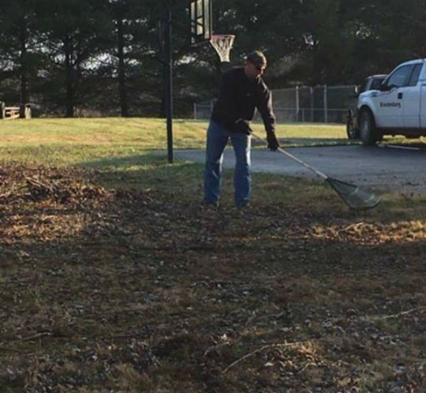 Man Cleans the Park From Leaves
