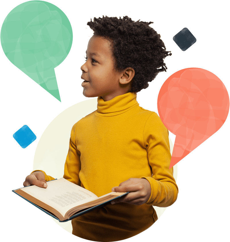little boy confidently holding a book to read