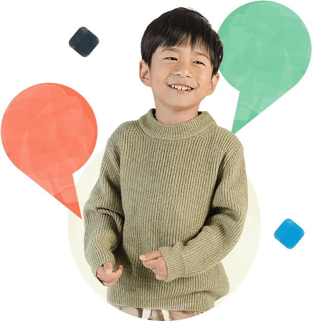 happy child in green sweater