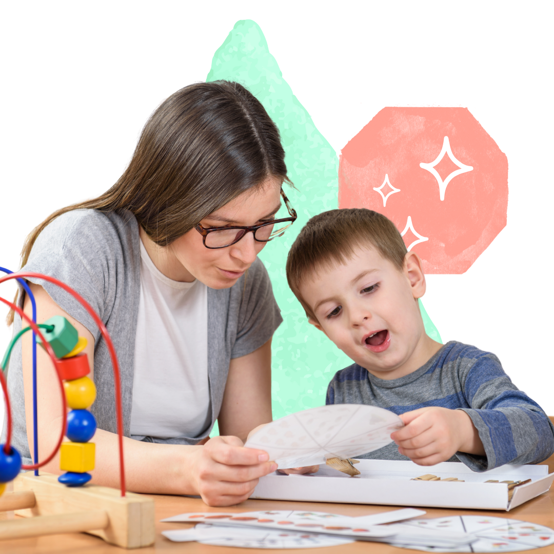 A woman and a child are sitting at a table looking at a piece of paper