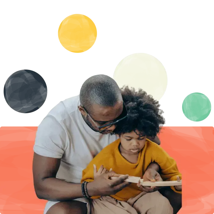 dad teaching his son with delayed speech