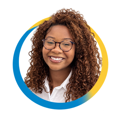 Mikalyn Gatewood, SLP-A, smiling in a circular portrait with layered blue and yellow accents.
