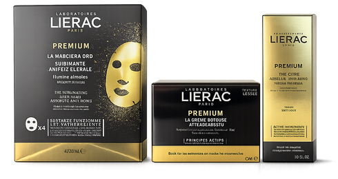Prodotti per la cura della pelle LIERAC Premium in confezioni nere e oro, tra cui vasetto, scatola e tubetto.