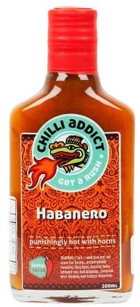A glass bottle of Chilli Addict Habanero hot sauce with a red cap and an orange label featuring a fire-breathing dragon.