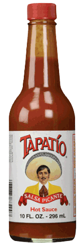 A bottle of Tapatio Salsa Picante hot sauce with its signature logo of a man in a sombrero and yellow jacket.
