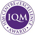 Purple circular logo with 