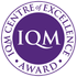 Purple circular logo with 