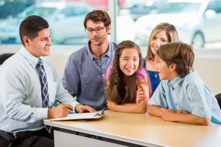 Parent consultation with father, mother, daughter, and son, and consultant