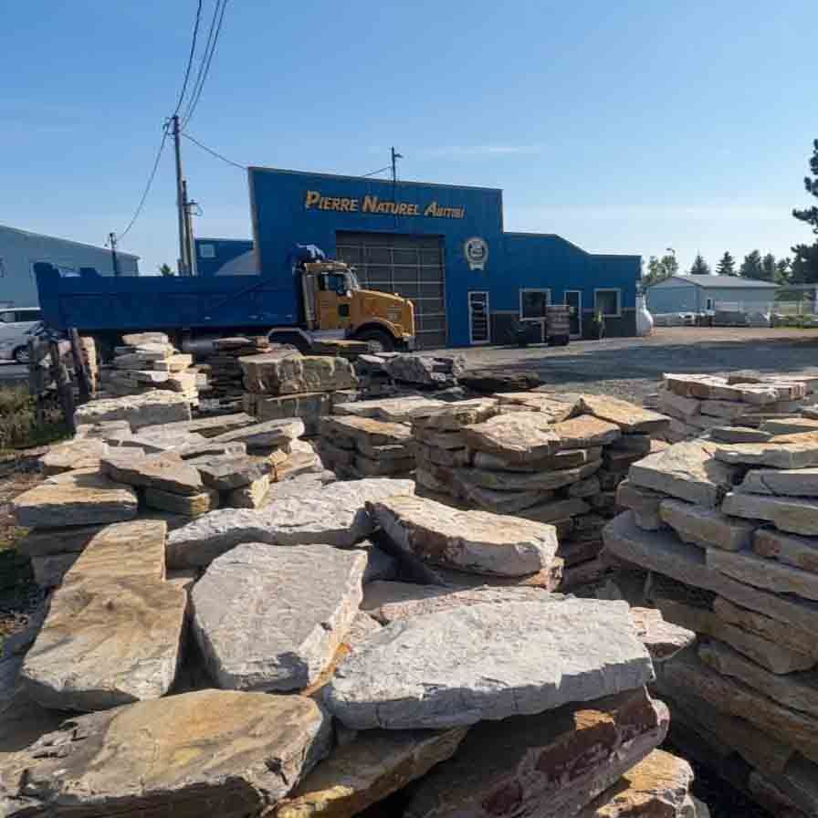 Une enseigne bleue et jaune pour entreprise pointe inc.