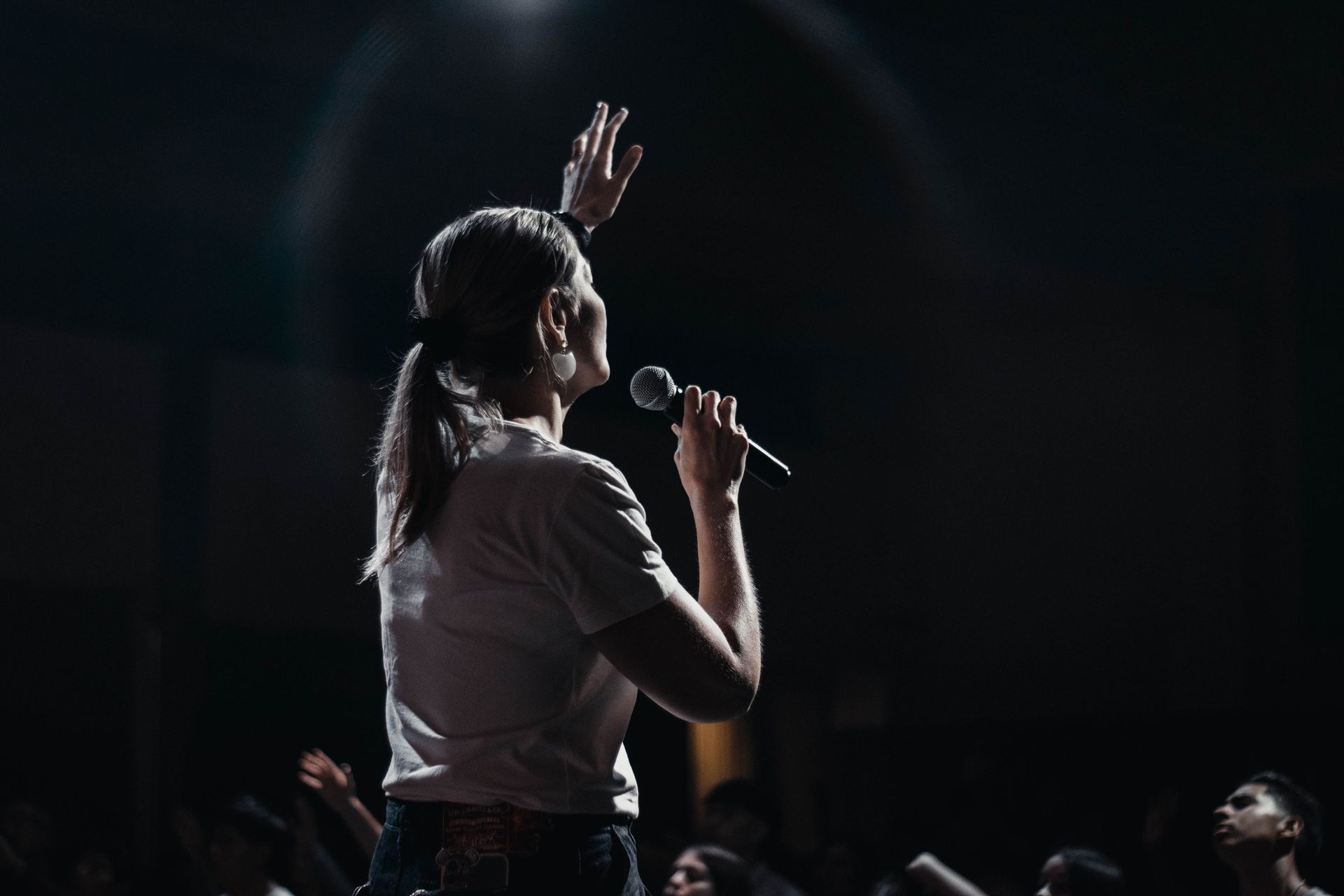 girl singing on stage