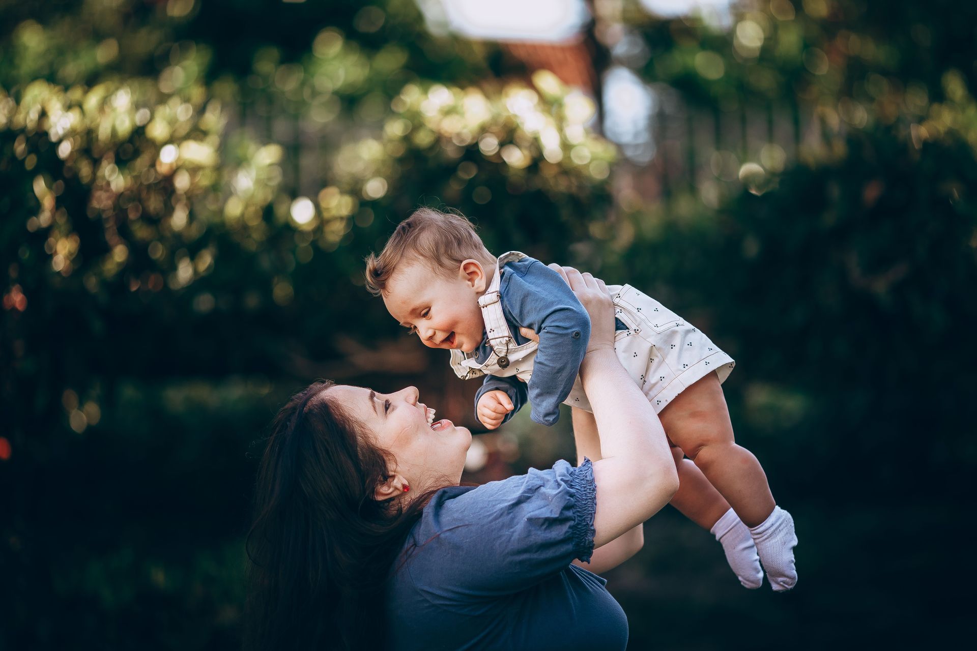 mom playing with her child
