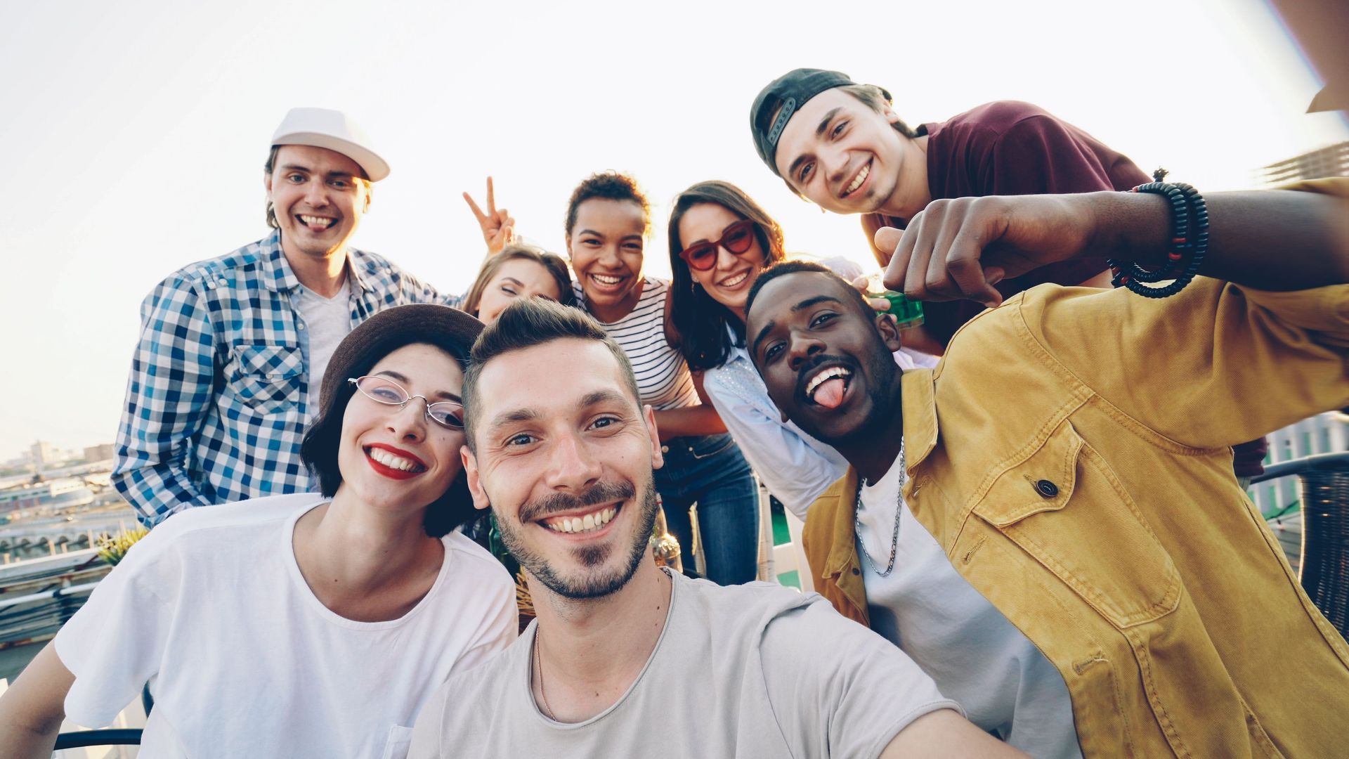 friends smiling at the camera
