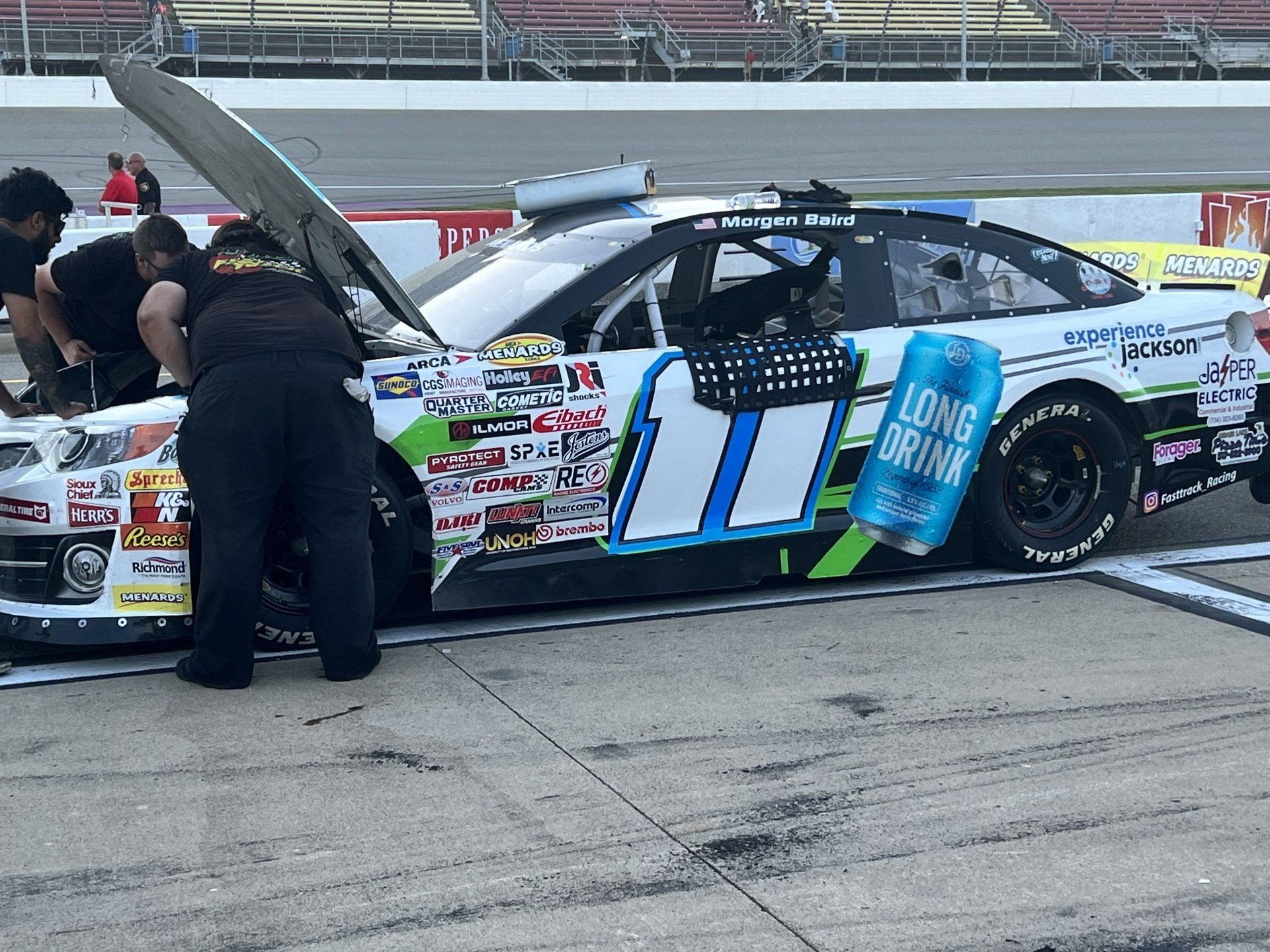 A race car with a can of long drink on the side