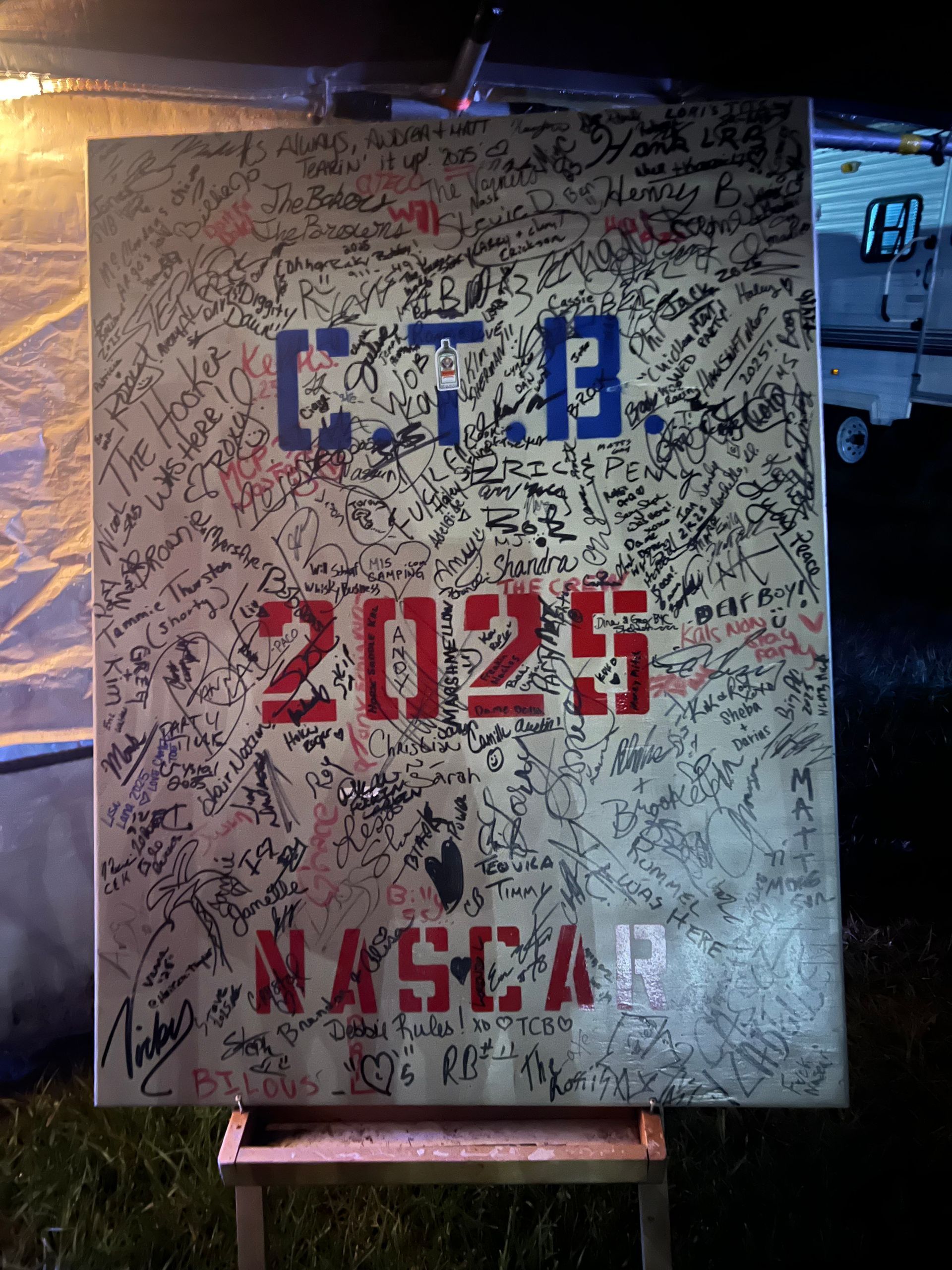 Wooden sign with graffiti, 