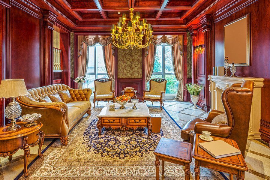 A living room filled with furniture and a chandelier.